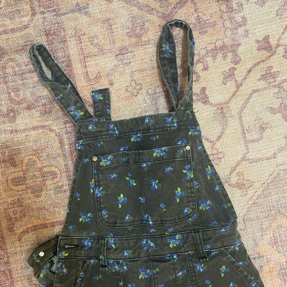 We Wore What black floral overalls